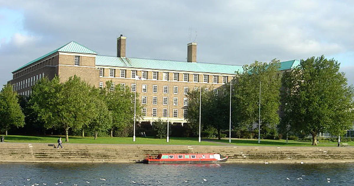 County Hall, Nottinghamshire County Council's headquarters building on the banks of the River Trent at West Bridgford, seen from across the water.